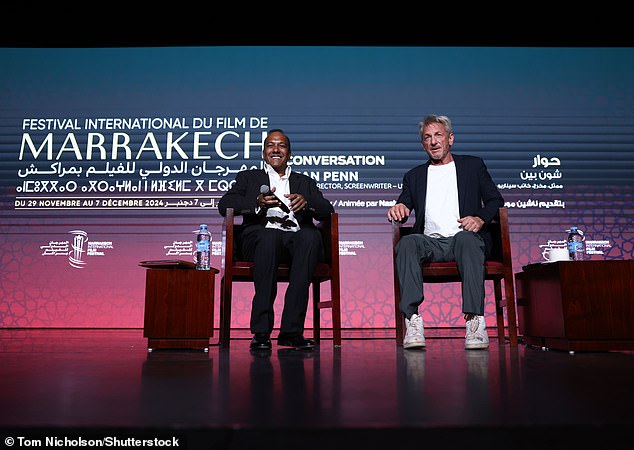 He donned a smart casual ensemble for the occasion wearing a black blazer and a plain white T-shirt as he spoke alongside festival director Nashen Moodley