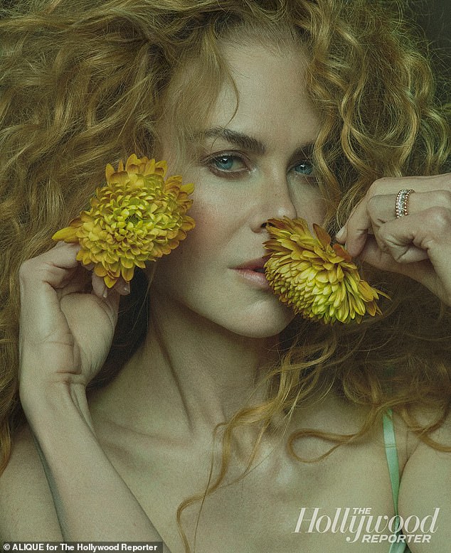 The Eyes Wide Shut star held flowers to her face in the striking shoot