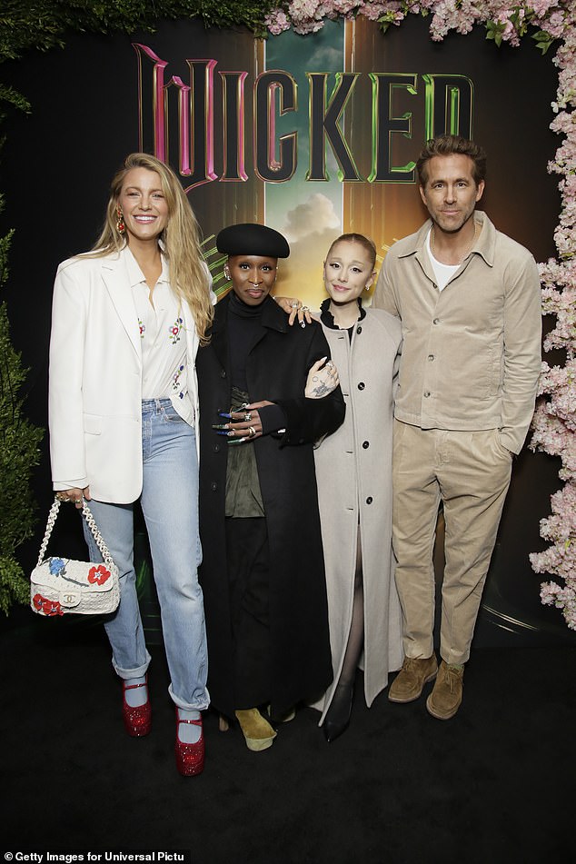 Blake Lively and her husband Ryan Reynolds towered over Wicked star Ariana Grande and Cynthia Erivo at a special screening of the musical film on Tuesday