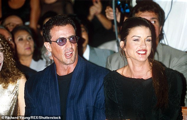 He believed that Dickinson had become pregnant with his daughter, however, after DNA tests proved that he was not the father, he eventually returned to Flavin, marrying her in 1997 - pictured with Dickinson in 1994