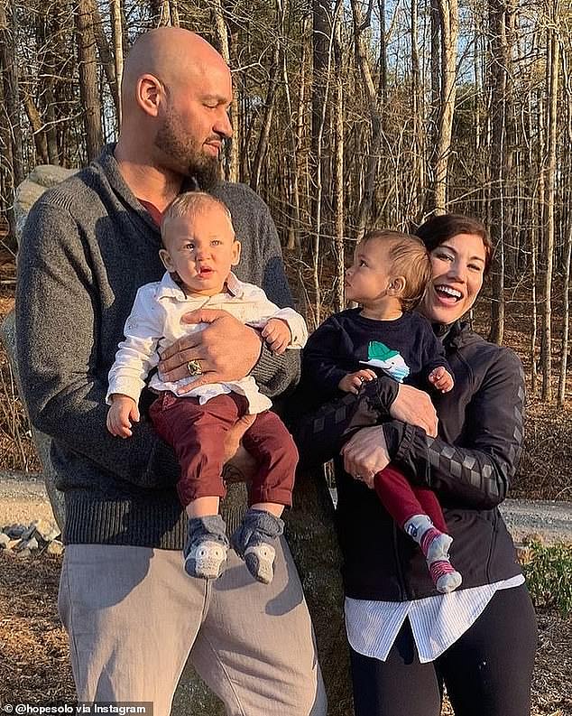 Solo is pictured with her husband, ex-Seahawks star Jerramy Stevens, and their twins