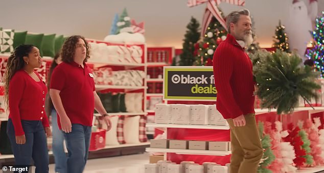 In another advertisement, hot Santa can be seen bicep curling a Christmas tree as he enthusiastically prepared for the Black Friday rush