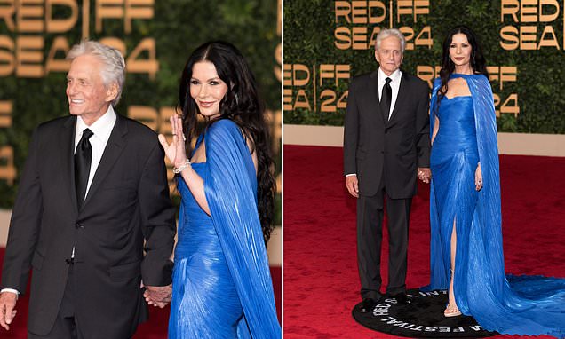 Catherine Zeta-Jones, 55, is a vision in dazzling royal blue gown as she puts on a