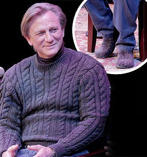 The James Bond actor, 56, who was promoting his racy new movie Queer, looked comfy stylish in a grey cable knit sweater which he teamed with he bedroom footwear.