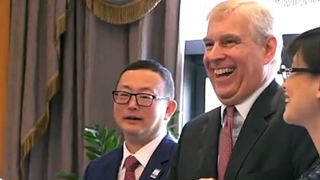 Prince Andrew (pictured, right) with Yang Tengbo (pictured, left)