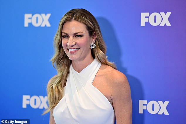 Erin Andrews recalled that colleague Michael Strahan advised her to 'work like you're broke'