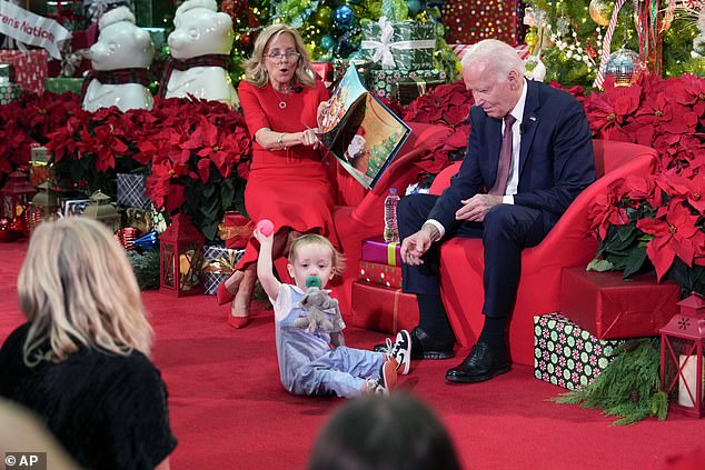 President Joe Biden, 82, played with a toddler Friday as first lady Jill Biden read Twas the Night Before Christmas amid fallout over a shocking report that suggested that his cognitive decline started years ago