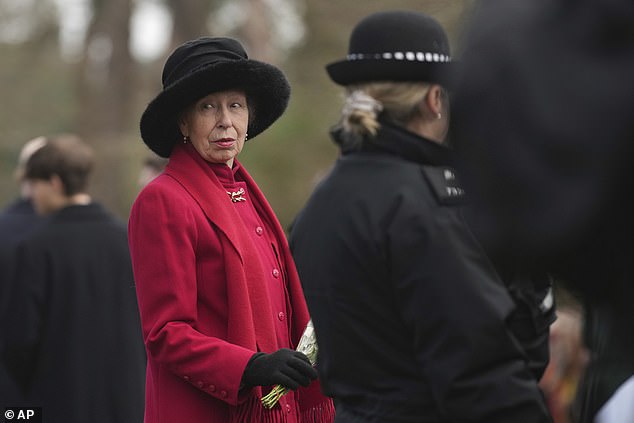 Princess Anne, 74, was glamorous in a crimson coat and matching scarf