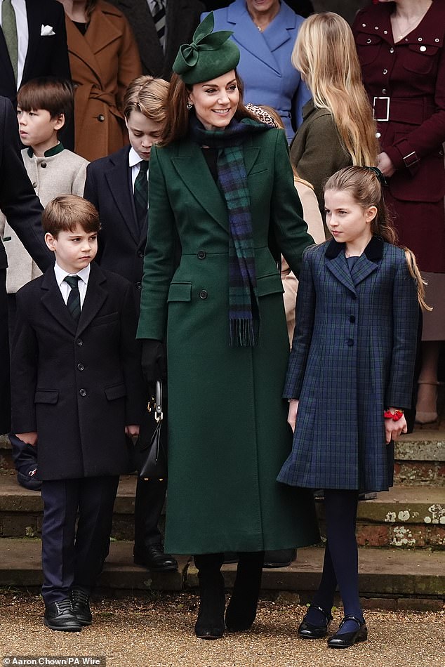 Nine-year-old Princess Charlotte echoed the dark green and blue shades of her mother's scarf in her outfit