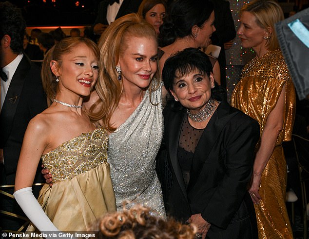 Nicole featured in another sweet scene as she posed for a photo with Wicked star Ariana Grande and her proud mother, Joan Grande