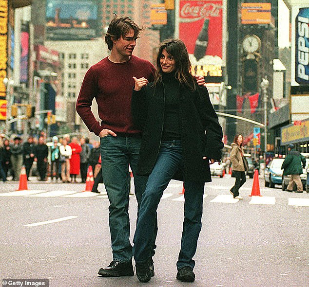 Tom Cruise and Penelope Cruz film a scene of their movie Vanilla Sky in New York's Times Square in November 2000