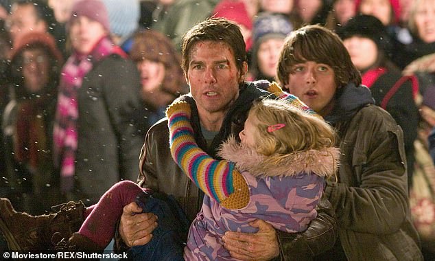 Pictured: Tom Cruise, Dakota Fanning and Justin Chatwin in Steven Spielberg's 2005 blockbuster War of the Worlds