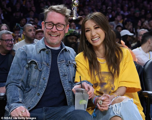 Macaulay Culkin and fiancée Brenda Song look loved up on date night at Lakers-Celtics game in Los Angeles