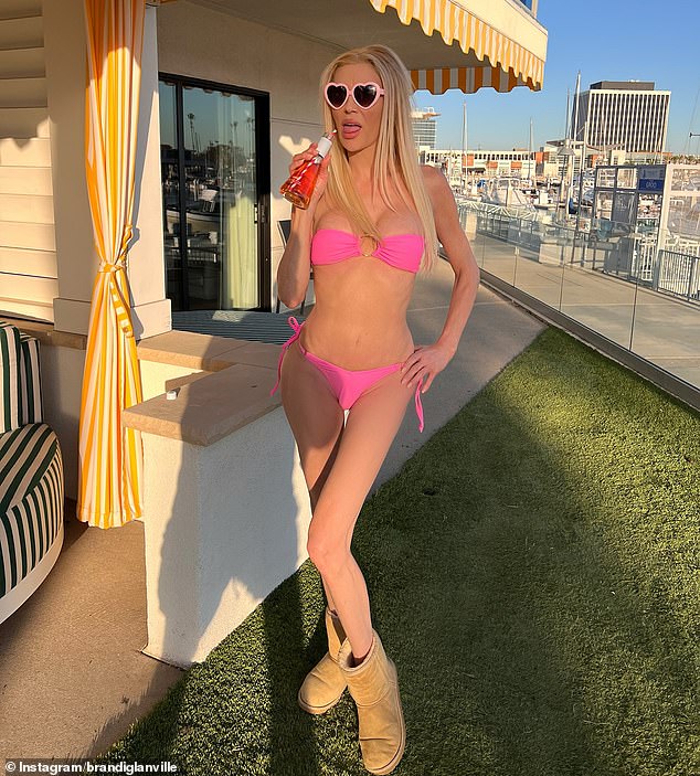 Brandi Glanville, 52, shows off her age-defying figure in a bright pink bikini as she shares stunning snaps in LA – after facial disfigurement battle