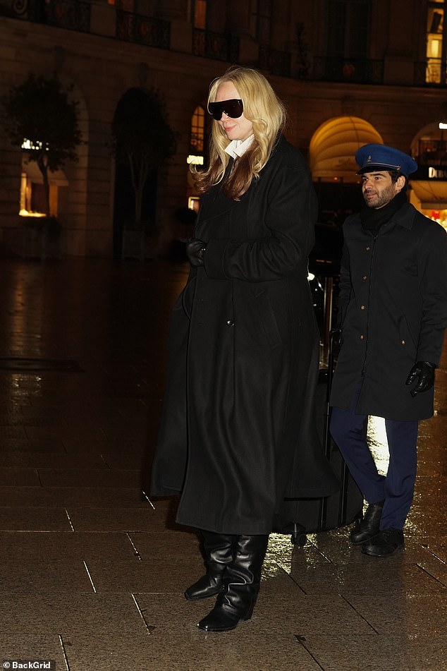 The Game of Thrones star wrapped up warm in a stylish wool coat and added inches to her tall frame with a pair of knee-high black boots