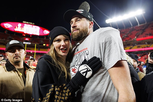 Travis celebrated on the field with girlfriend Swift after their AFC Championship win vs the Bills