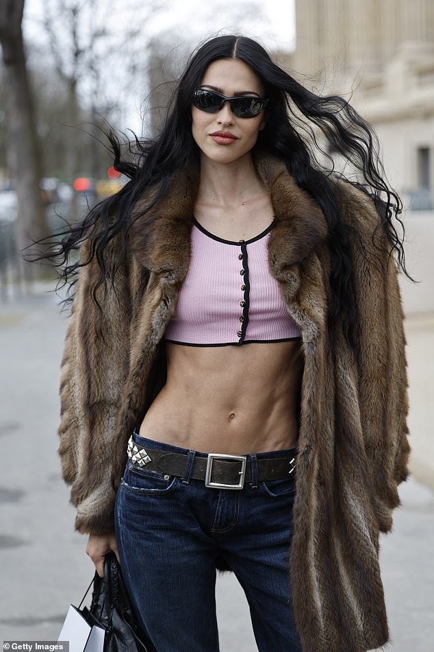 Amelia Gray opted for jeans and a crop top outside Chanel, during Haute Couture Spring-Summer 2025