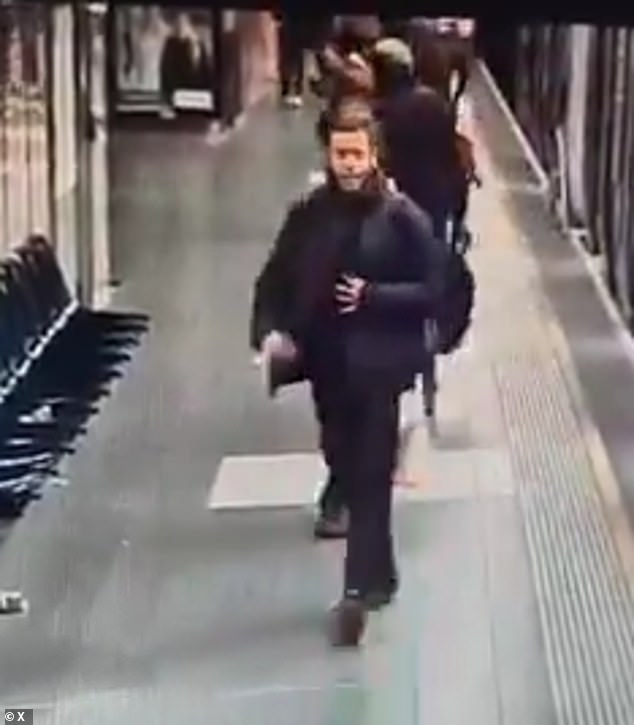 A man, who stabbed a stranger in the neck, is seen on CCTV footage exiting the platform just before the attack on Sunday