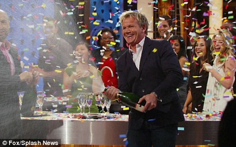 Celebration: Gordon Ramsay cracked open a bottle of champagne to mark Miller's win