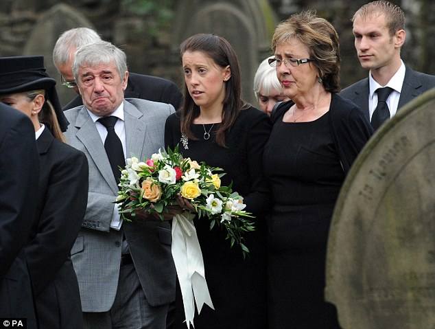 Devastated: Gemma Redmond attends the funeral of her husband Ian who was tragically killed on their honeymoon