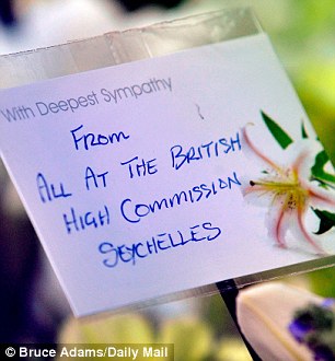 Tribute: A message at the funeral is left by the High Commission