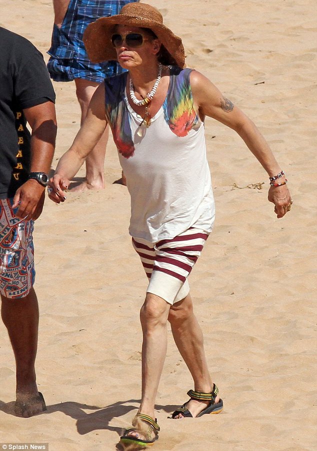 Hawaiian holiday: Steven was enjoying a stroll on the beach on the morning of his 64th birthday