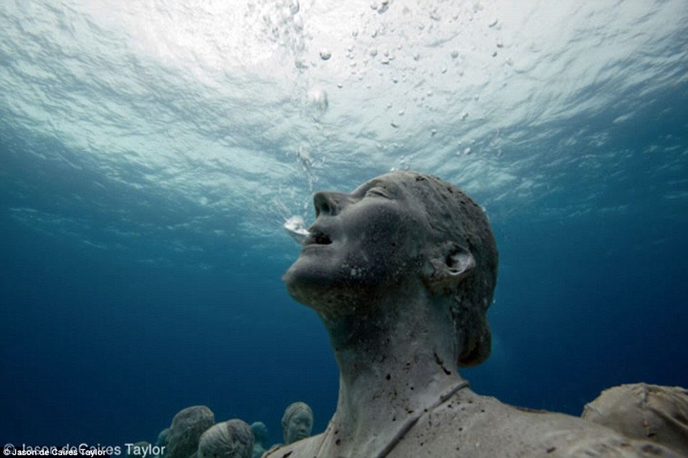 Alive: Captured just right, bubbles appear to flow from a woman's mouth who tilts her head back up to the sun