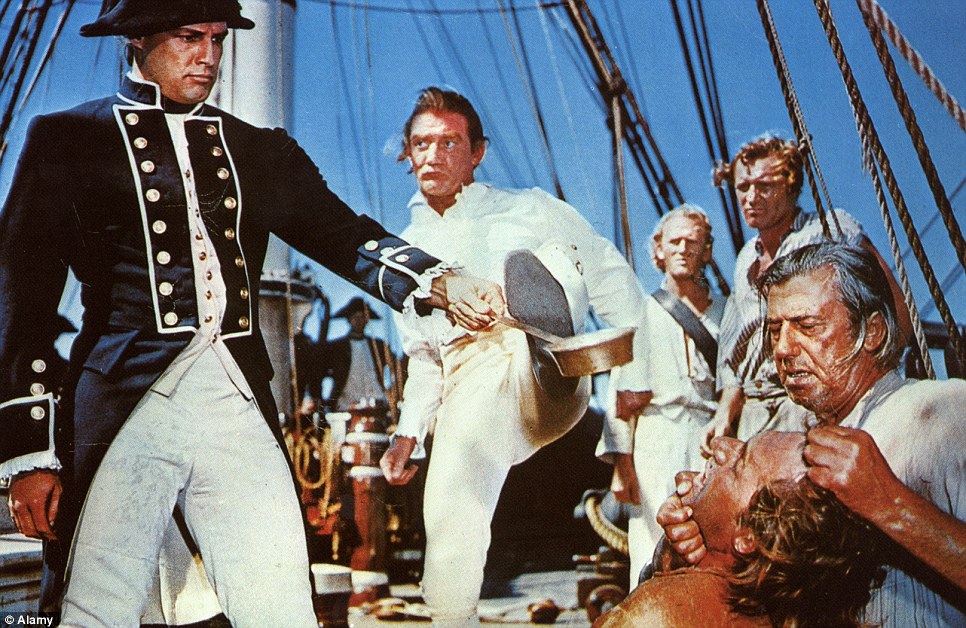 The 1962 film, Mutiny On The Bounty, starring Marlon Brando (left, as Fletcher Christian) and Trevor Howard (centre, as Captain Bligh)