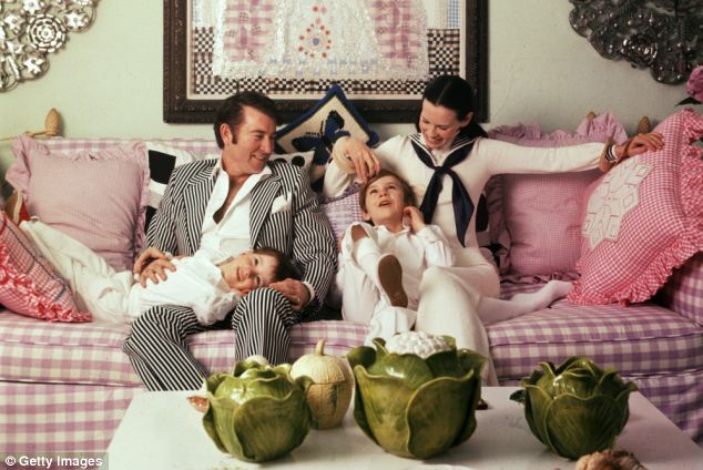 Family portrait: The Coopers photographed in their Long Island home in 1972. Anderson Cooper is seated by his mom, heiress Gloria Vanderbilt Cooper, while brother Carter is on their father Wyatt Cooper's lap