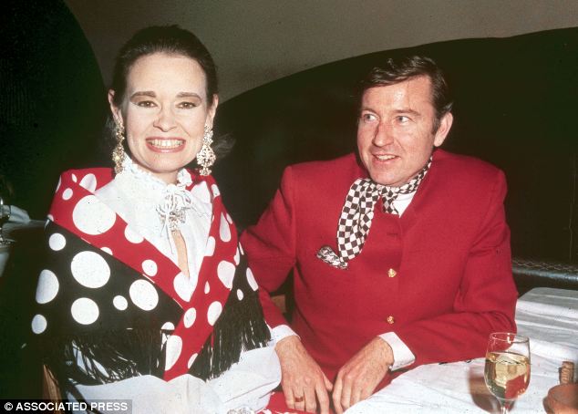 Socialite Gloria Vanderbilt photographed with her husband actor Wyatt Cooper at a Truman Capote party in New York, 1968