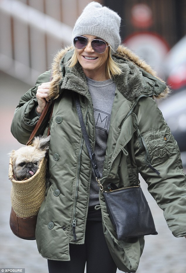 Michelle Collins leaves Coronation Street set with her little dog in ...