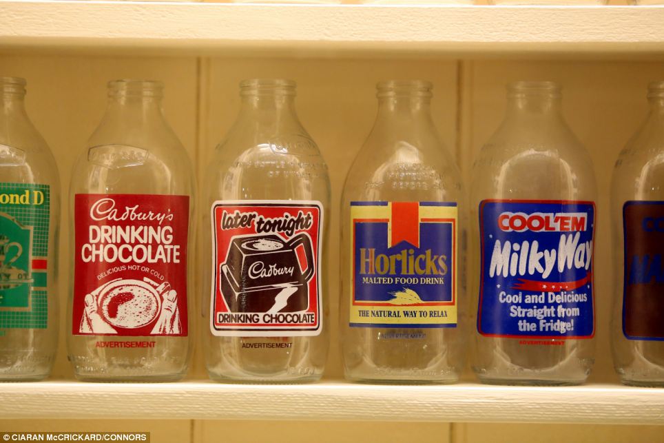 Got milk: A display of old milk bottles, complete with advertisements, lines the shelves in the grocers