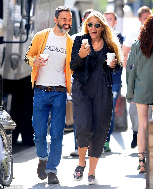 Too funny! Busy Philipps and Marc Silverstein are seen laughing as they go for a coffee run in New York City on Saturday