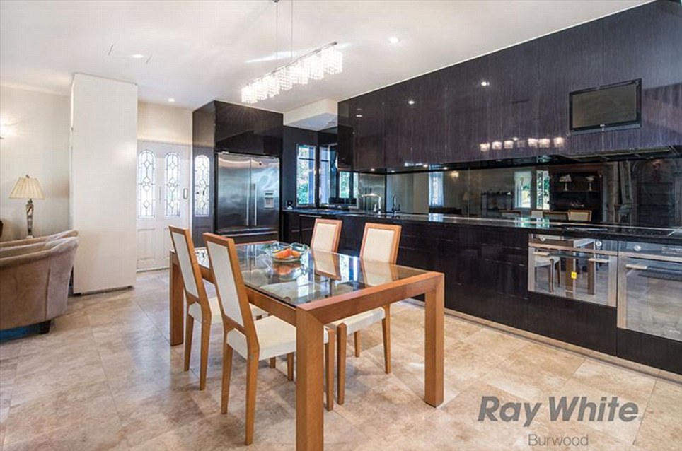 Highlights of the house includes its expansive kitchen which fitted granite benchtops and a commercial gas stove, complete with European appliances