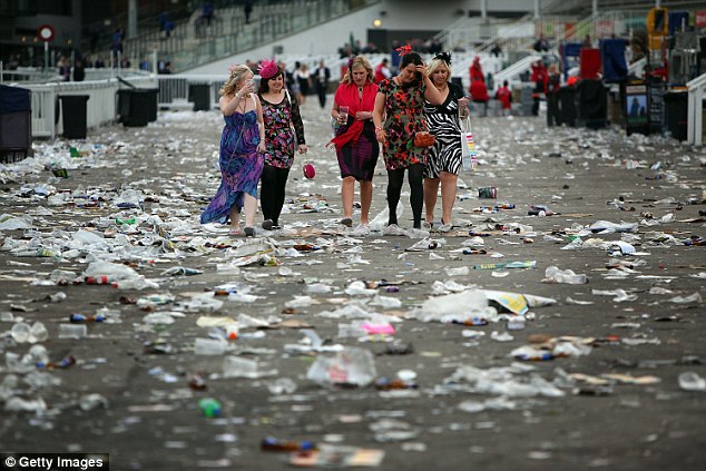 Racegoers make their way home on the second day of the Grand National meeting at Aintree in 2010