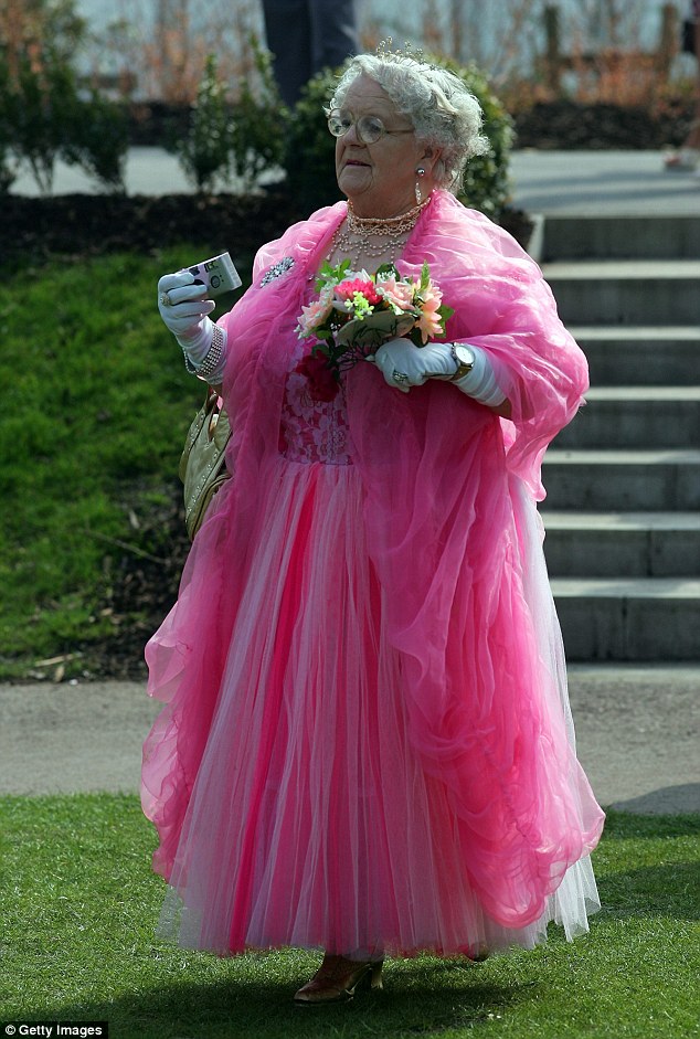 Race fan Lilly Evans dresses up in her  finest during the second day of the Grand National meeting in 2007