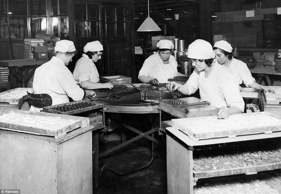 Harrods staff at Trevor Square building-  now regarded as one of the most prestigious addresses in Knightsbridge, London-pick out the luxury chocolates ready to pack