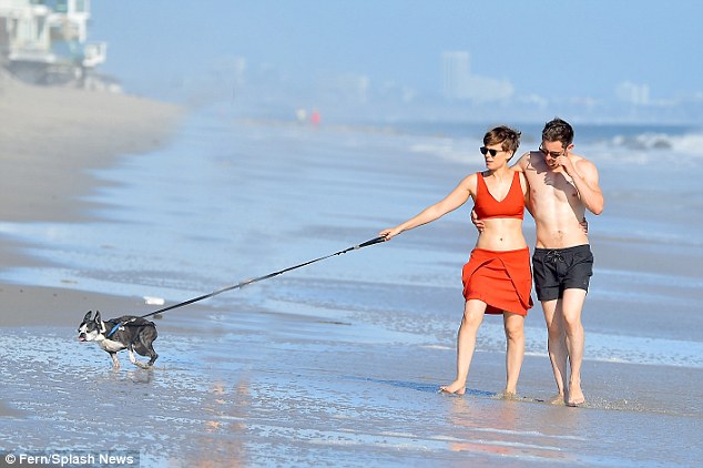 This way! The pair shared the dog walking duties by taking turns on the leash