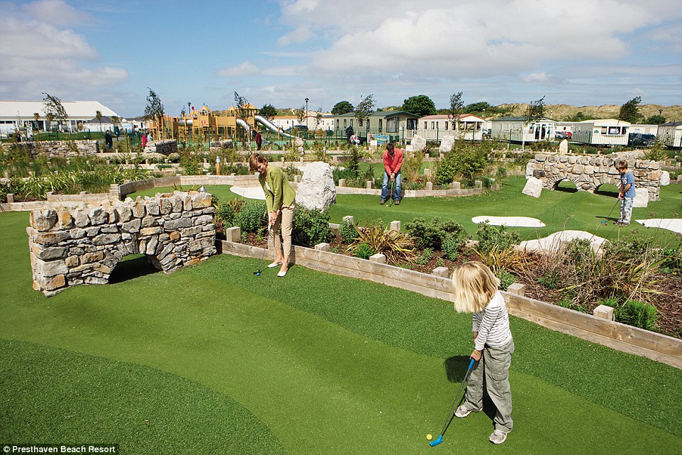 Hole in one: Tee off for a spot of adventure golf at the resort's mini golf course which has a range of holes to attempt