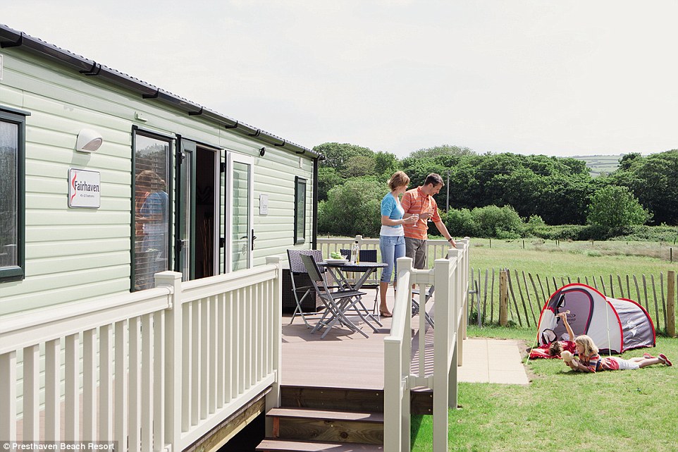 Children are able to run round and play in the grass area outside cabins. There is also a terrace area for serving outdoor meals 