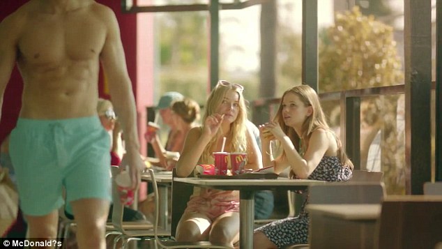 The McDonald's store in Oak Park, north of Melbourne, initially put up a sign reading 'no shirt, no shoes, no service', despite an advertising campaign showing semi-naked patrons in stores (pictured)