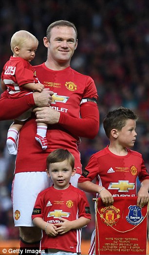 Rooney, who was told about the attempted break-in immediately after the game at Old Trafford, was said to be 'deeply shocked' by the incident, which occurred between 8.30pm and 8.45pm. Pictured: The Rooney family are seen at the player's testimonial match this week