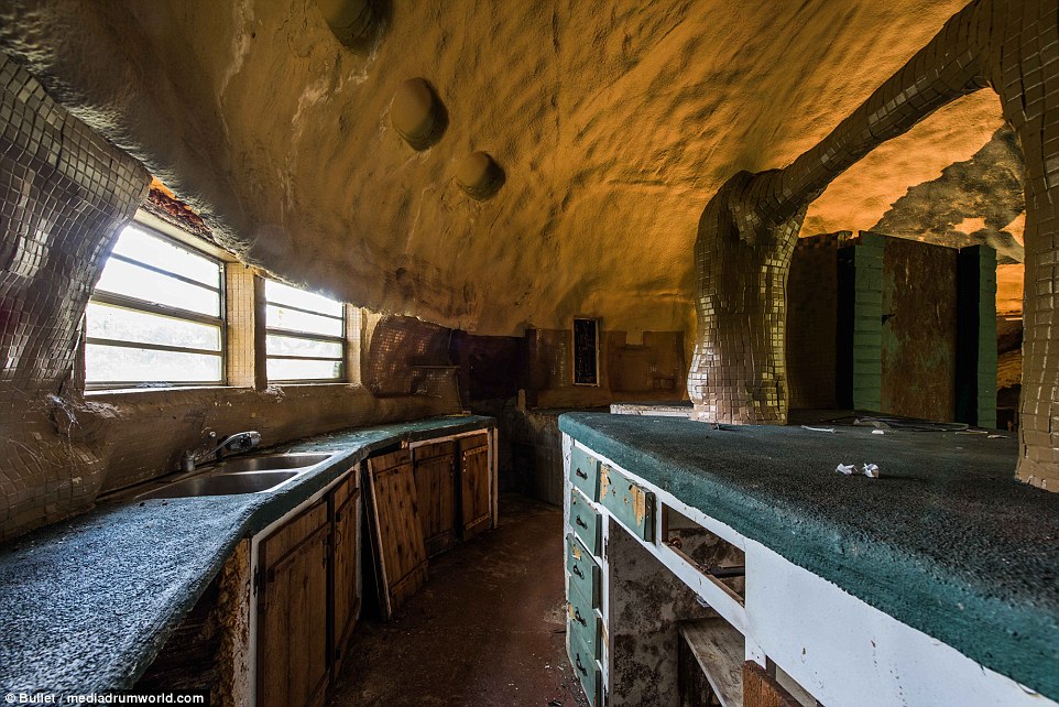 Inside the kitchen, the fixtures and fittings look rickety while the building's paintwork is looking incredibly dated 