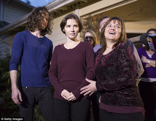 Amanda Knox is to return to the central Italian city of Pergugia in a bid to overcome the trauma of imprisonment. She is pictured in front of her parents' home in March 2015 after she and Raffaele Sollecito had their convictions overturned&nbsp;