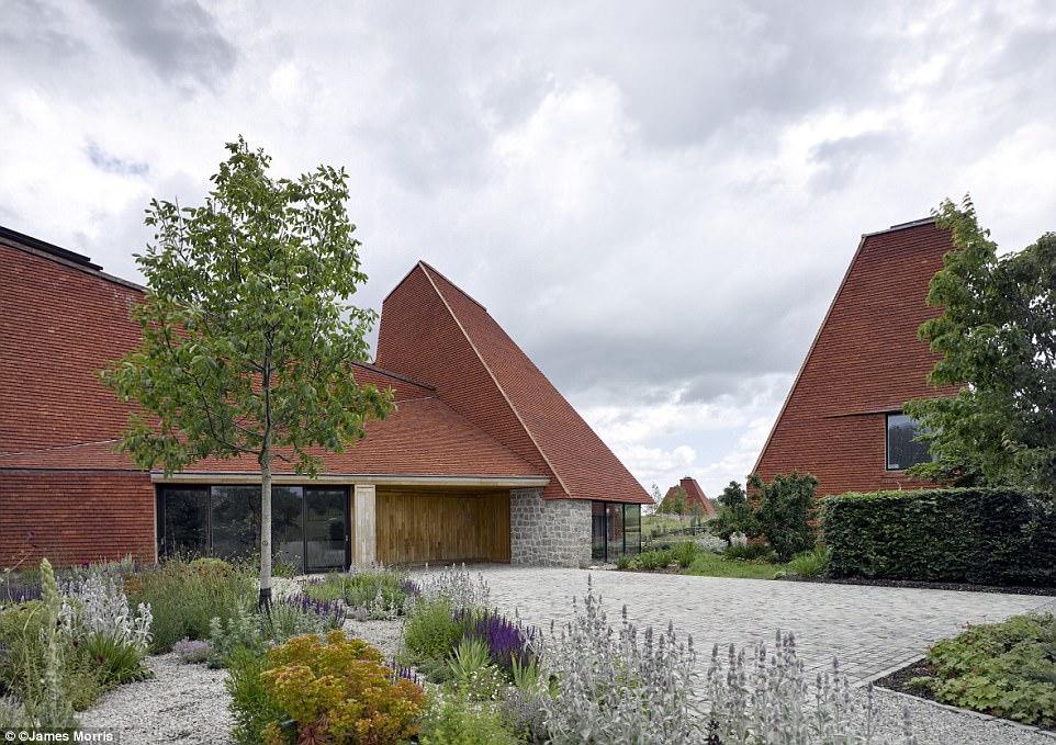 Winner: Caring Wood, in Kent, pictured, was crowned House of the Year on Tuesday night's episode of Grand Designs...but some viewers accused the property, which can house 15 people, of looking 'ugly' and 'pretentious'