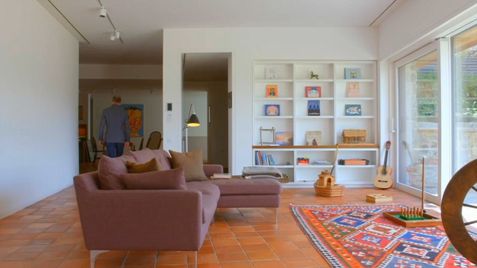 Simplistic: The red tiled floor is featured throughout the entire home that gives it a warm feel in each room. The living areas in each oast house are kept minimal and neat