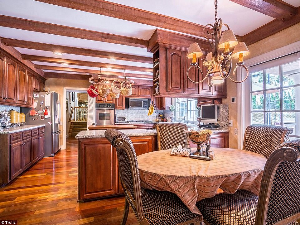 What's cooking? The kitchen featured hard wood floors and granite counters 