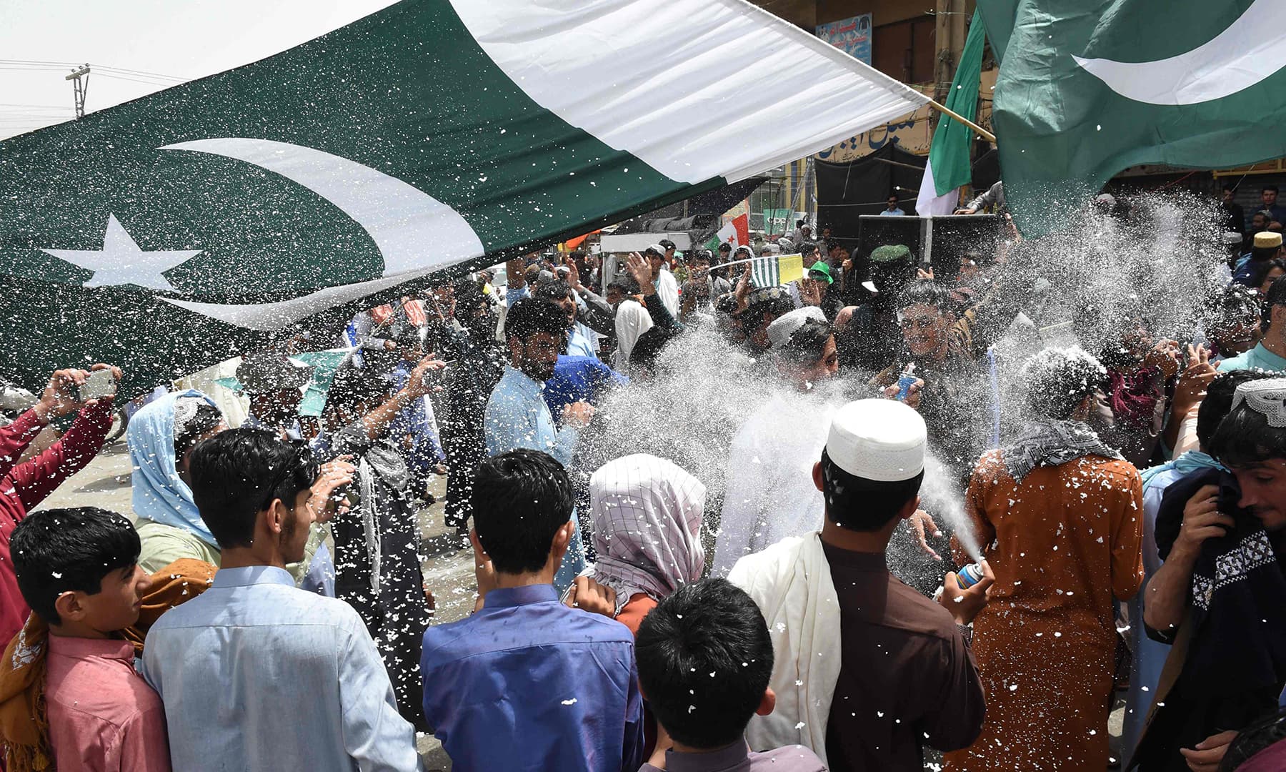 People take part in Independence Day celebrations in Quetta on August 14. — AFP