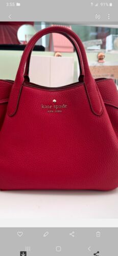 WINE RED KATE SPADE HANDBAG...