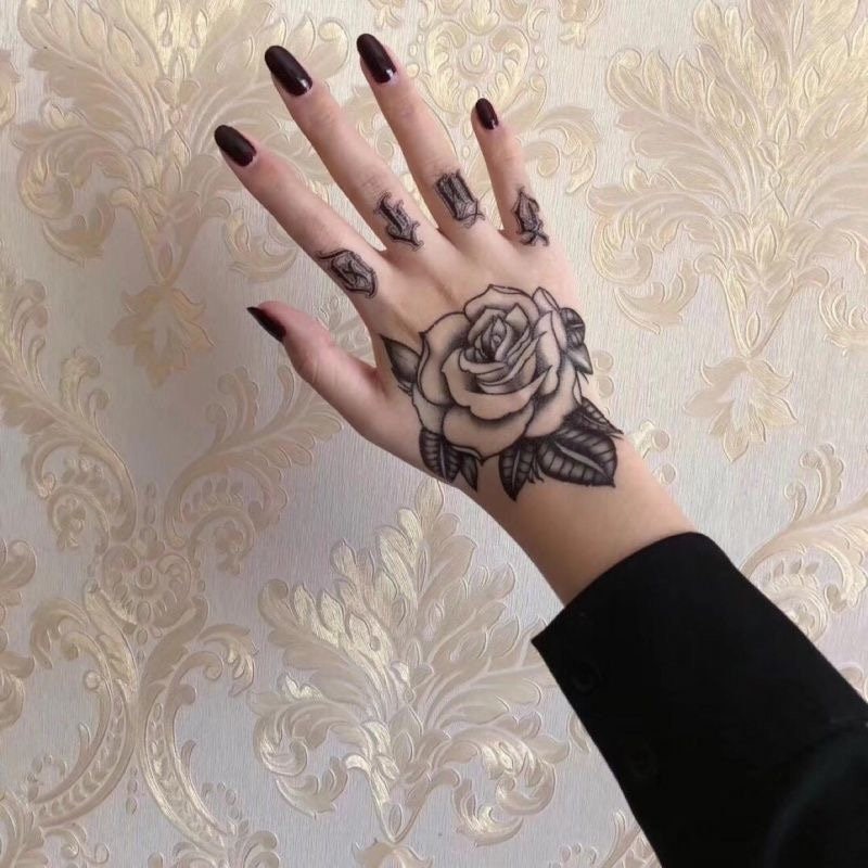 Rose hand tattoo by Jordan Croke  Post 15131